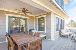 The large back deck with propane grill and outdoor dining space make entertaining groups fun and easy